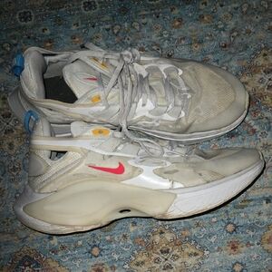 Nike Cream and Red Running Shoes